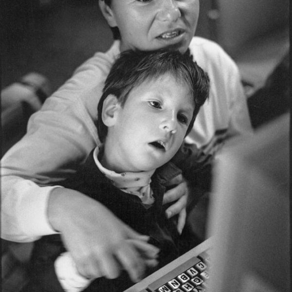 Child and her mother using a computer at the Disabled Children's Computer Group in Berkeley, Calif.