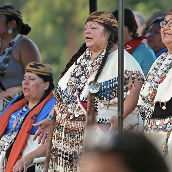 Vallejo, CA — Helene Sisk, Winnemem Wintu song leader, (center, eyes closed) and other Winnemem Wintu women sing as part of the Run4Salmon opening ceremony at Sogorea Te’, a former indigenous village site. September 9, 2017. Tom Levy/The Spiritual Edge